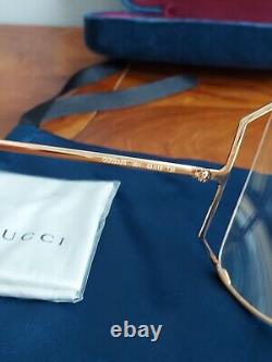 Gucci 0252 Oversized Gold Frame Clear Pearl Logo Sunglasses