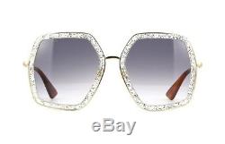 Gucci GG0106S glitter crystal gold/grey shaded (006 P) Sunglasses