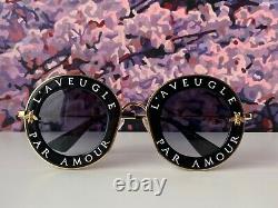 Gucci GG0113S 001 Black Gold Sunglasses Gray Lens L'Aveugle Par Amour