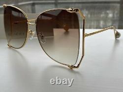Gucci GG0252S Gold Frame Brown Lens Women's Sunglasses Oversize Butterfly