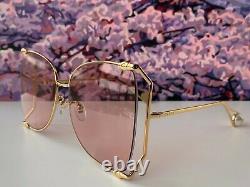 Gucci GG0252S Gold Frame Butterfly Sunglasses Pink Lens Women's Oversized