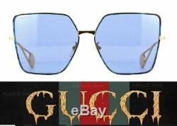 Gucci GG0436S 004 Women's Smoke Blue & Gold Metal Oversized Square Sunglasses