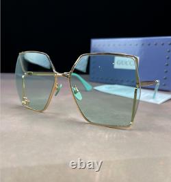 Gucci GG0817s blue Gold Metal Square Sunglasses