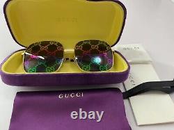 Lunettes de soleil Gucci GG0414S à monture métallique multicolore avec monogramme en solde