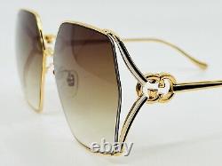 Lunettes de soleil Gucci GG1322SA 004 64mm M en métal doré avec verres dégradés marron