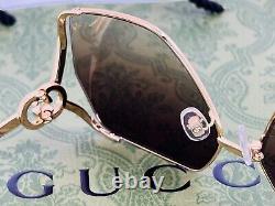 Lunettes de soleil Gucci GG1322SA 004 64mm M en métal doré avec verres dégradés marron