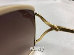 Lunettes de soleil Gucci pour femmes GG0593SK ivoire or verres gris 59mm authentiques
