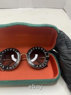 Lunettes de soleil rondes Gucci pour femmes L'Aveugle Par Amour avec protection UV en noir + étui