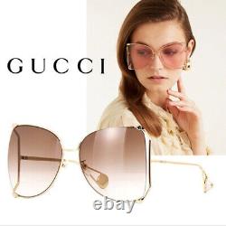 Nouvelles Lunettes de soleil pour femmes Gucci GG0252S Oversized en métal avec des verres dégradés marron en forme de papillon.